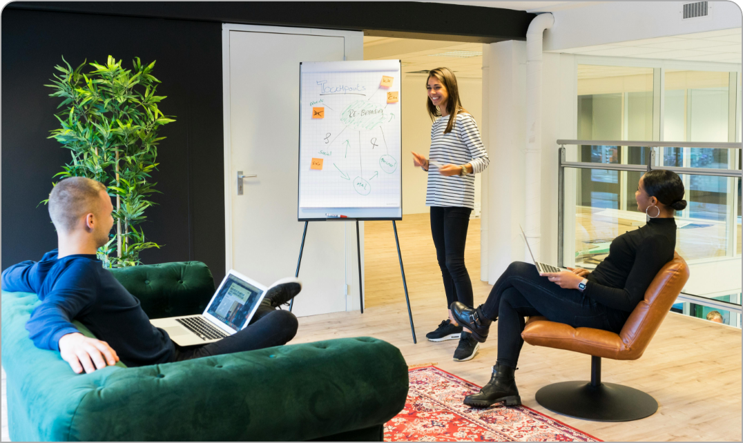 a woman leading a workshop