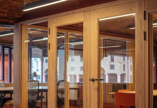 timer partitions used to create meeting rooms to complement interior