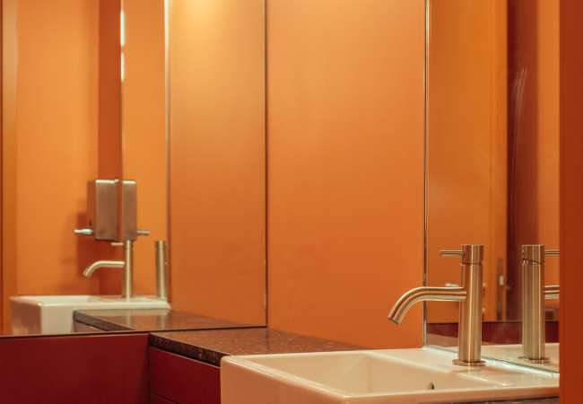 wash basin and shelf within the w/c