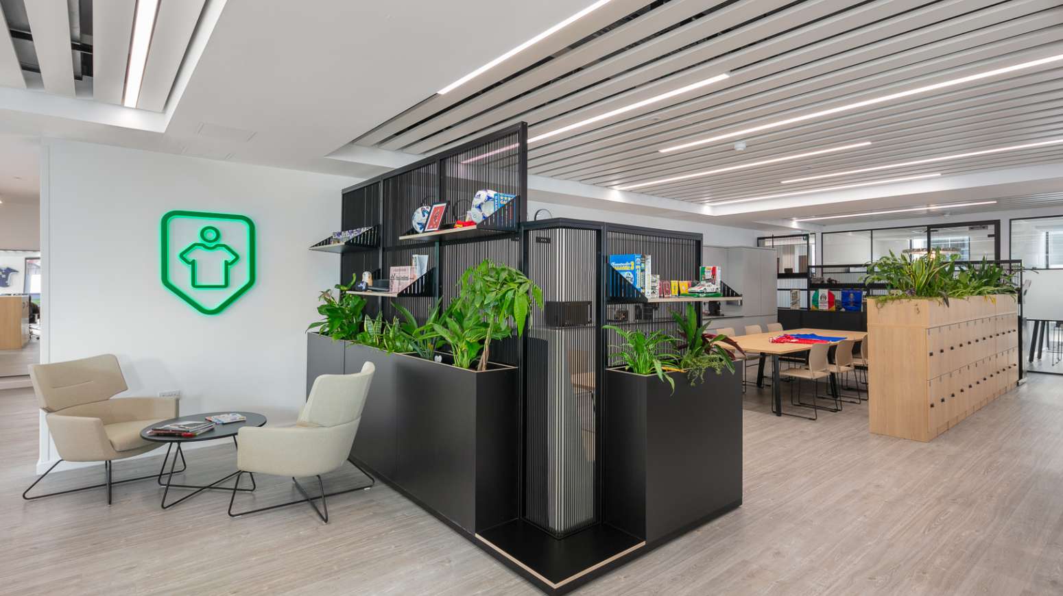 reception with two kudos seats harp dividing screens  and open plan office