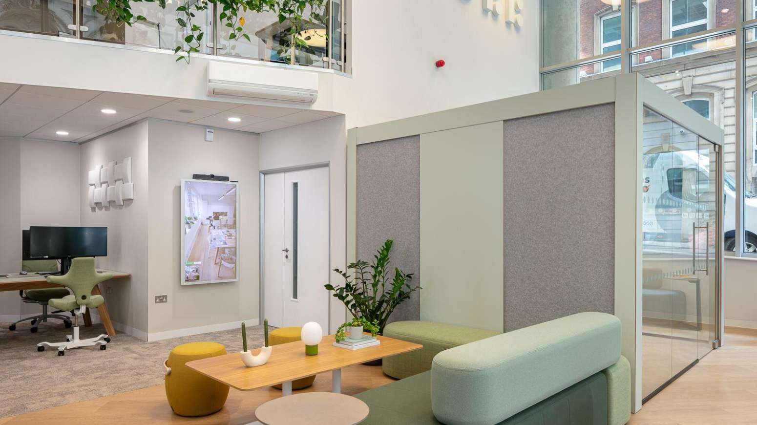 Showroom shot within includes mezzanine and flokk sign