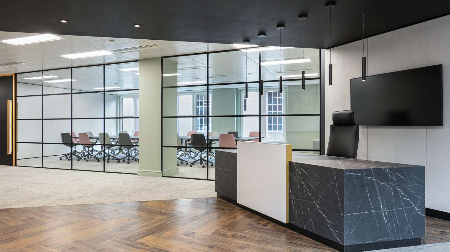 reception desk with view of boardroom