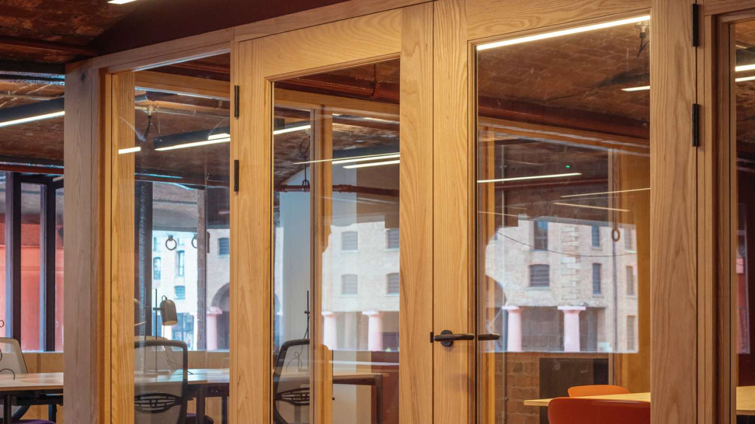 timer partitions used to create meeting rooms to complement interior