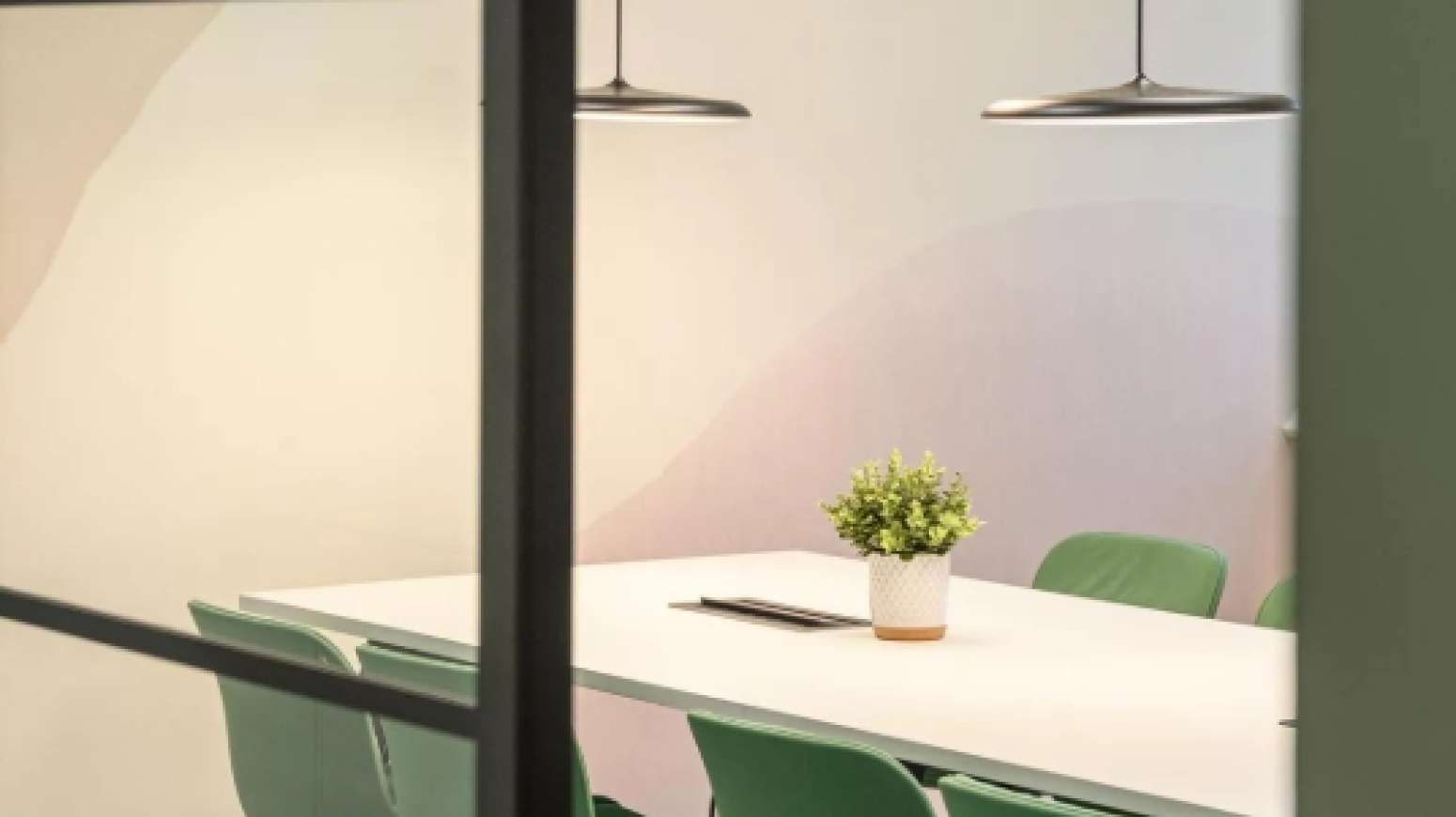 6 person meeting room with feature lighting and feature wallcoverings too