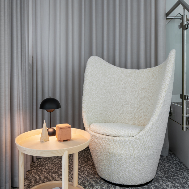 seating with table and curtain back drop