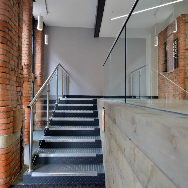 entrance internal shot new stairs exposed brick and original features