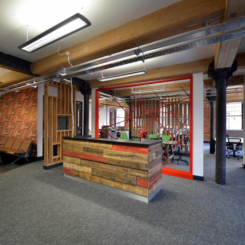 timber clad reception desk and timber wall dividers