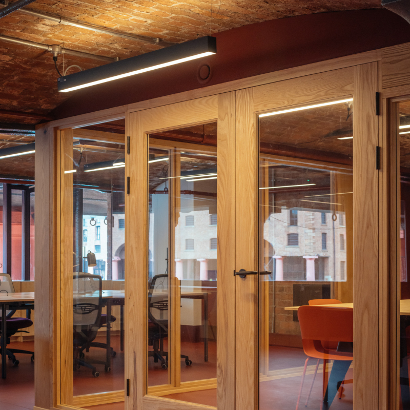timer partitions used to create meeting rooms to complement interior